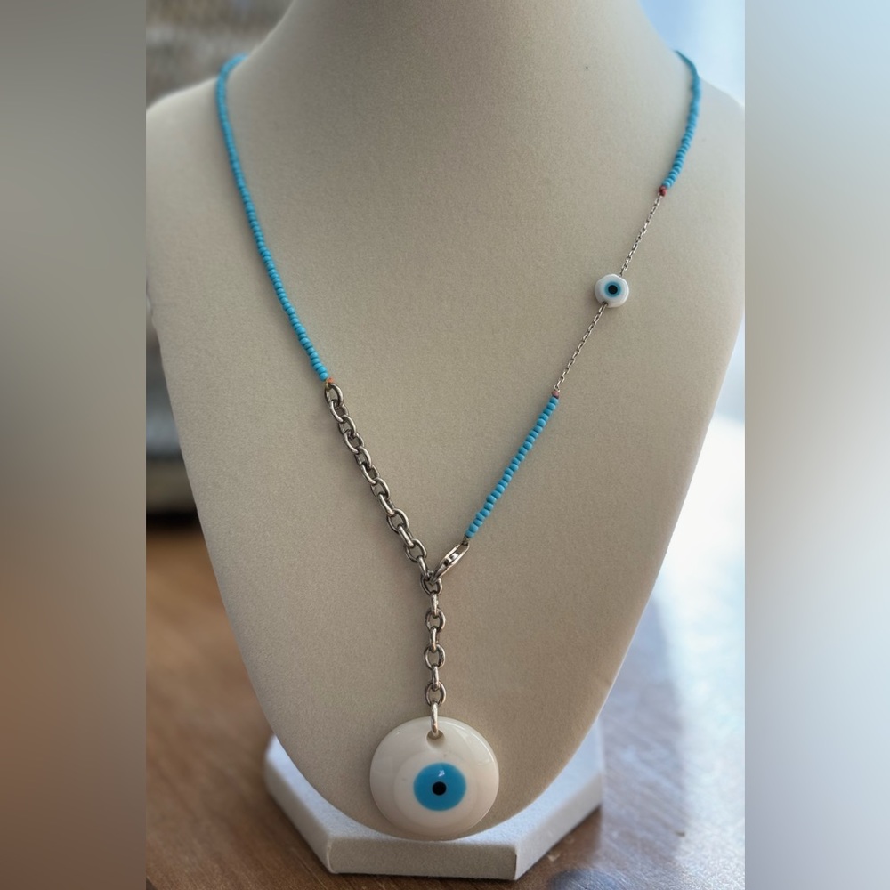 A handmade piece. Blue evil eye necklace for women or teens.
